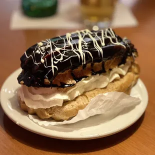 Chocolate eclair (it is HUGE!)  Not a heavy desert at all, but I recommend you share haha