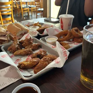 Turkey Sandwich  Chicken Wings 8pc Onion Rings Chicken Strips (4)