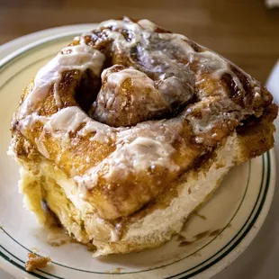 a cinnamon roll on a plate