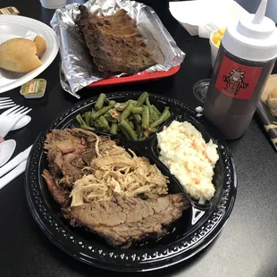 Ribs, pulled pork, chicken and brisket.  Sauce is homemade but the meat is so favorable it&apos;s not needed!