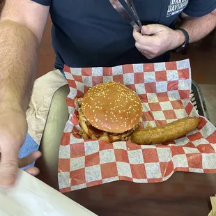 a hamburger and a pickle