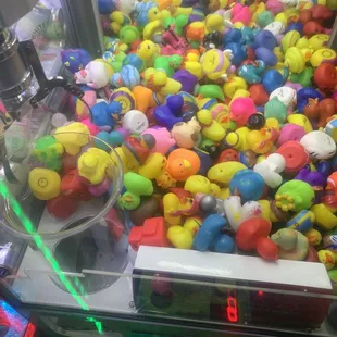 a bunch of rubber toys in a machine