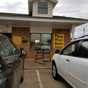 Front entrance, don't miss it ... its hidden!!