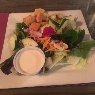 Side salad with homemade blue cheese dressing.