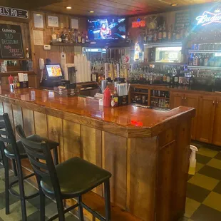 a bar with stools