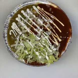 Our MUSHROOM ENCHILADAS, Christmas Style covered with both our New Mexico Red and Green Chile sauces