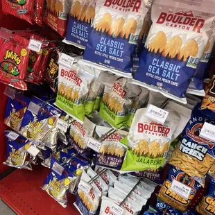 a variety of snacks on display in a store