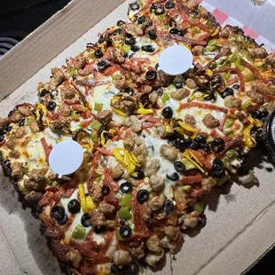 Gorgeous pizza covered in black olives.