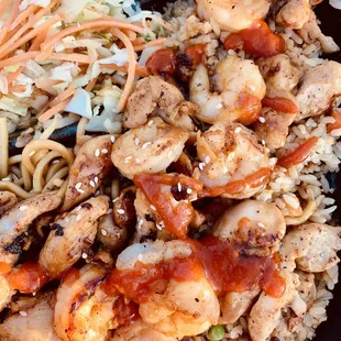 Chicken and shrimp with fried rice and veggies