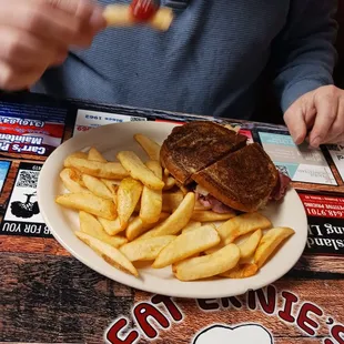 Delicious reuben and fries.