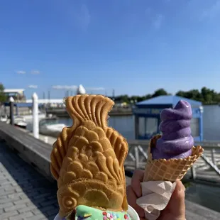 Matcha/ube swirl in cup with taiyaki cone + ube with a waffle cone