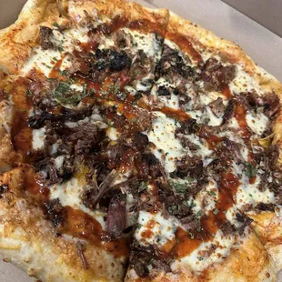 Brisket and pulled pork pizza