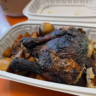 Hot roasted chicken quarter with seasoned roasted sweet potatoes. Good!