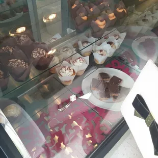 a display case full of desserts