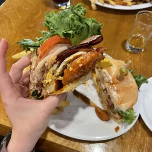 Chick&apos;n Little Headwich. Chicken Tenders, OG Sauce, cheese, fried egg, ham, bacon, lettuce, tomato, onion &amp; cherry-pepper mayo.