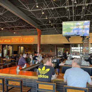 people sitting at the bar