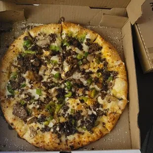 a pizza in a pizza box