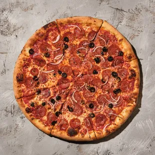 Hot Honey Pie: Red sauce, mozzarella, pepperoni, red onions, black olives and a drizzle of our hot honey