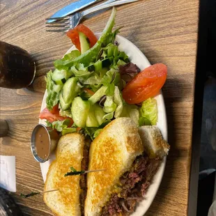 Frisco burger with salad.