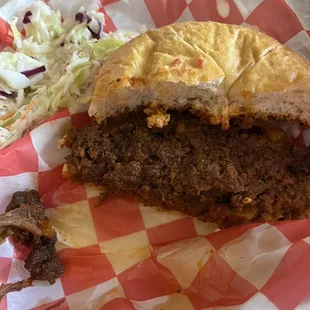 Here is half of the Sloppy Joe. Very good! A bit spicy and I was really impressed with the Slaw. Excellent meal.