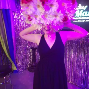  a woman holding a bouquet of flowers