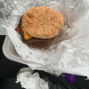 a hamburger wrapped in paper