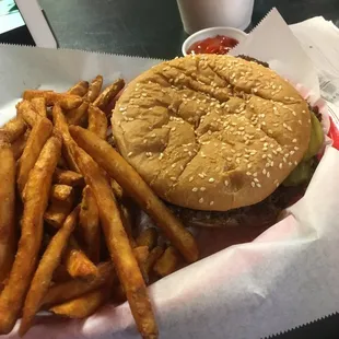 Fat Mo&apos;s Burger with seasoned fries.