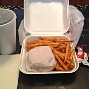 Little Mo&apos;s combo with seasoned fries and a large root beer.