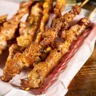 skewered chicken on a stick