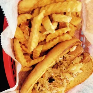 Milwankee Brat, a brat, grilled and served on a toasted bun, topped with sauerkraut and spicy brown mustard &amp; fries for hubby