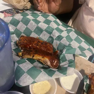 a man sitting at a table with food