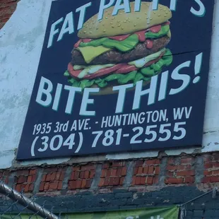 a sign on the side of a building