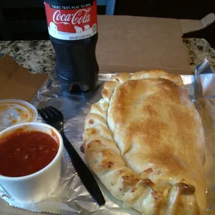 Massive Calzone on a 20 oz. Coke = $9.34
