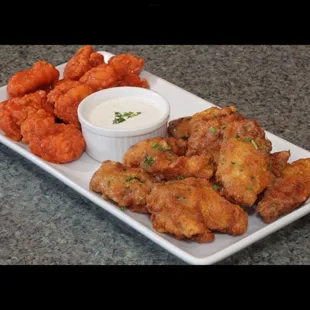 Our delicious bone in wings make a perfect appetizer! Many flavors  to choose from, served with ranch and/or blue cheese.