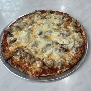 Sausage mushroom with tomato sauce even though I requested white sauce