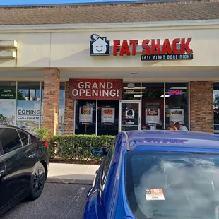 a car parked in front of the store