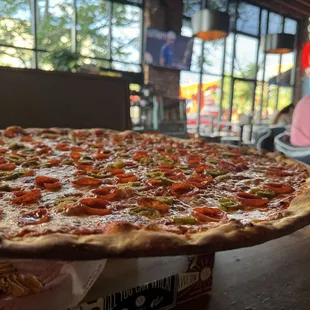 Biggest slice of pizza I&apos;ve ever had. If there&apos;s only two of you, you can probably get a small. I could only eat one and a half.