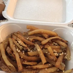 Soggy cold fries with raw chunks of garlic