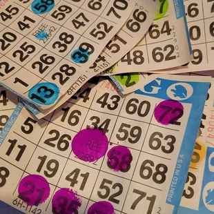a pile of bingo cards