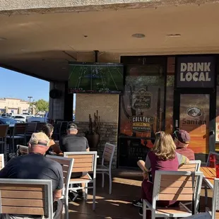 Outside patio area with TV&apos;s