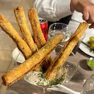 a plate of breadsticks