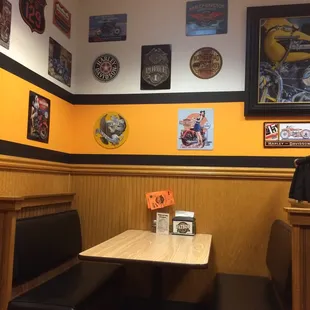 Cozy little place with lots of motorcycle signs.