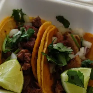 Legnua and Tripas tacos