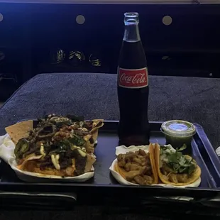 Nachos with asada and chicken street tacos