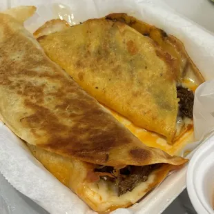 Birria TNT and quesabirria taco