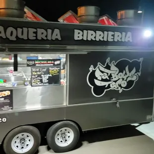 Delicious food truck with cute waitresses