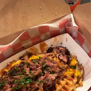 a box of food and a drink