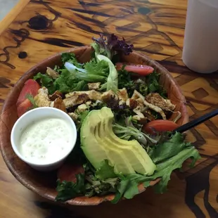 Grilled chicken salad. I have them hold the onion and croutons, but that's just me! Yum!
