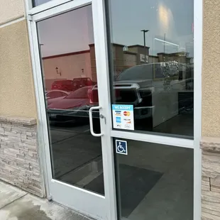 the reflection of a car in the window