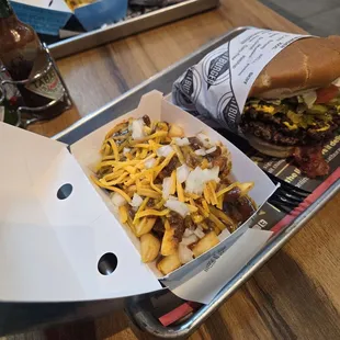 Chili cheese fries with onions, the chili and fries were piping hot so they melted cheese